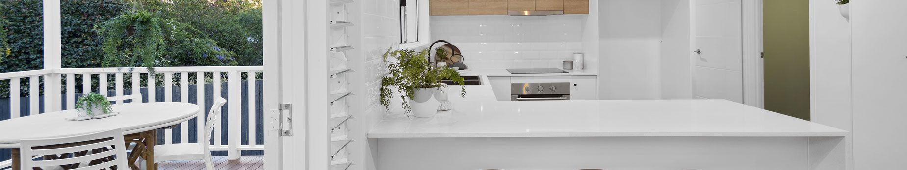 A neat kitchen counter besides patio